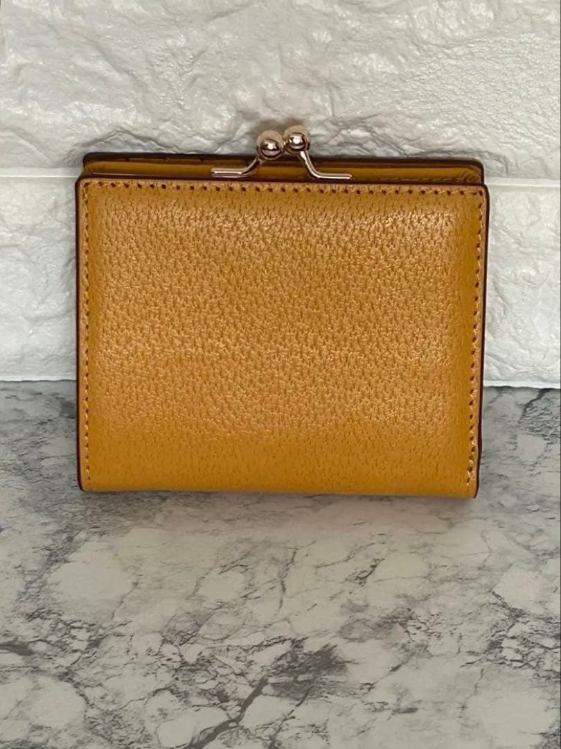 新品未使用】Vivienne Westwood 二つ折り財布 イエロー